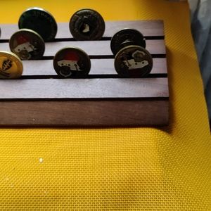 Military coins 12 different and wooden base. US army.